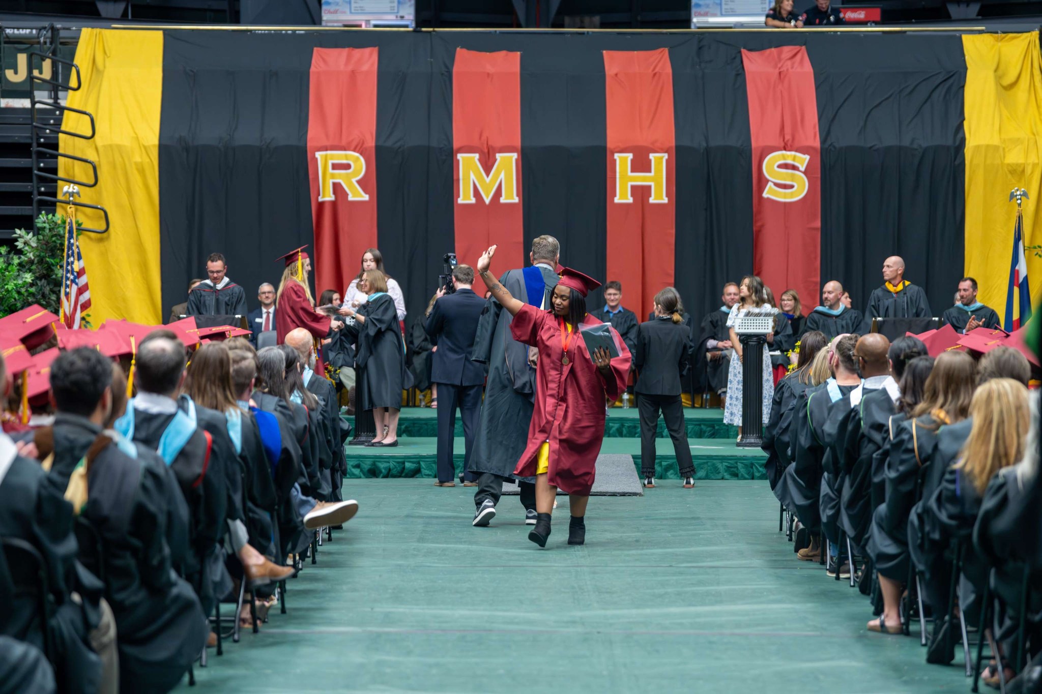 Rocky Mountain High School grad shows off diploma.