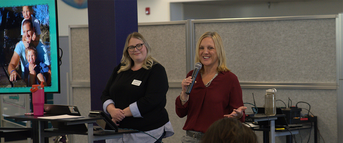 Presenters share information at the mental health summit.