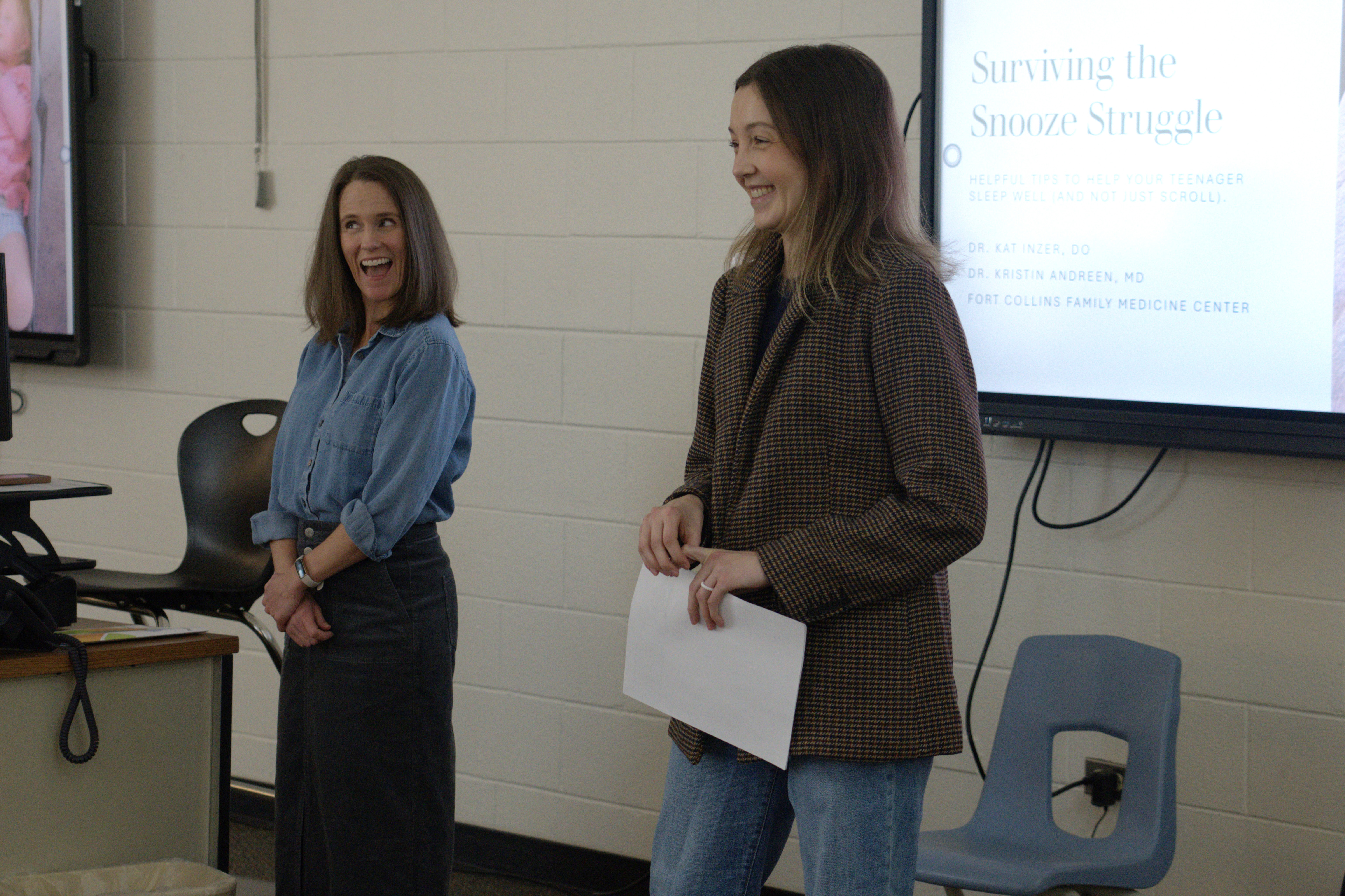 Presenters share information at the mental health summit. 