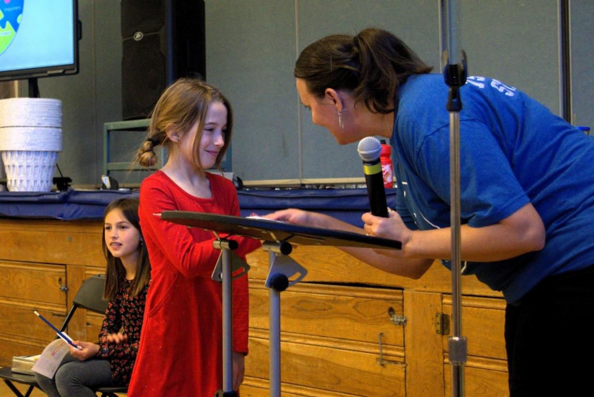 A Dunn Elementary student is honored for traits of character. 