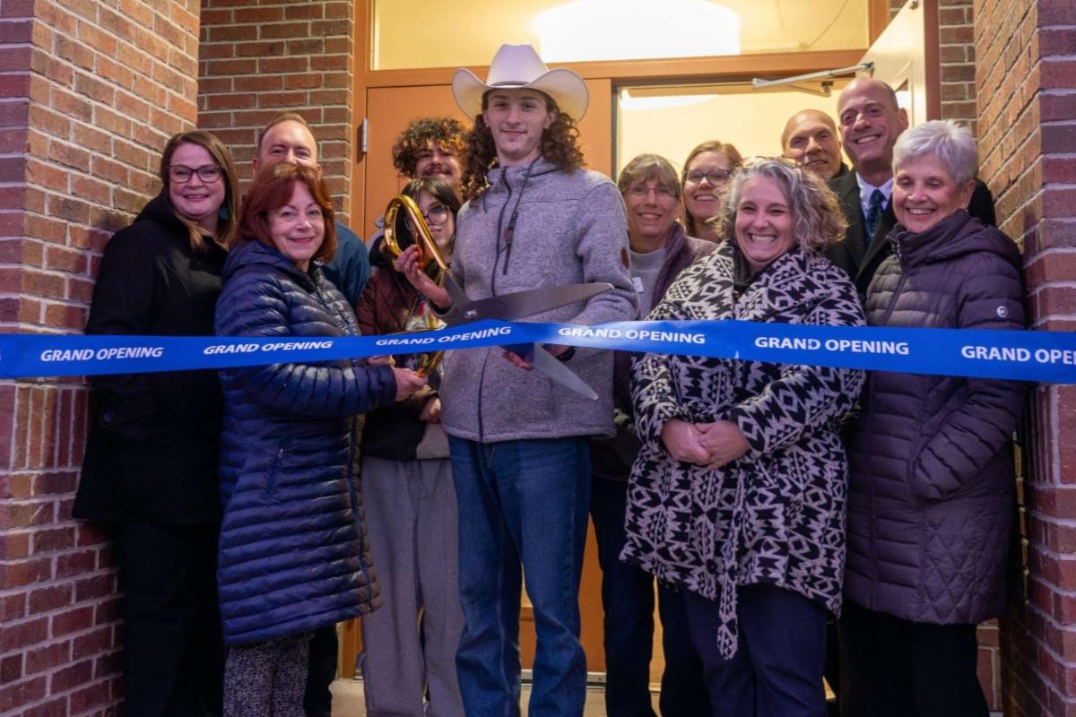 People gathered for the ribbon-cutting ceremony for the Landing