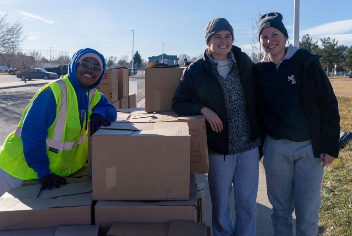 Poudre High School students collecting food for families in need.