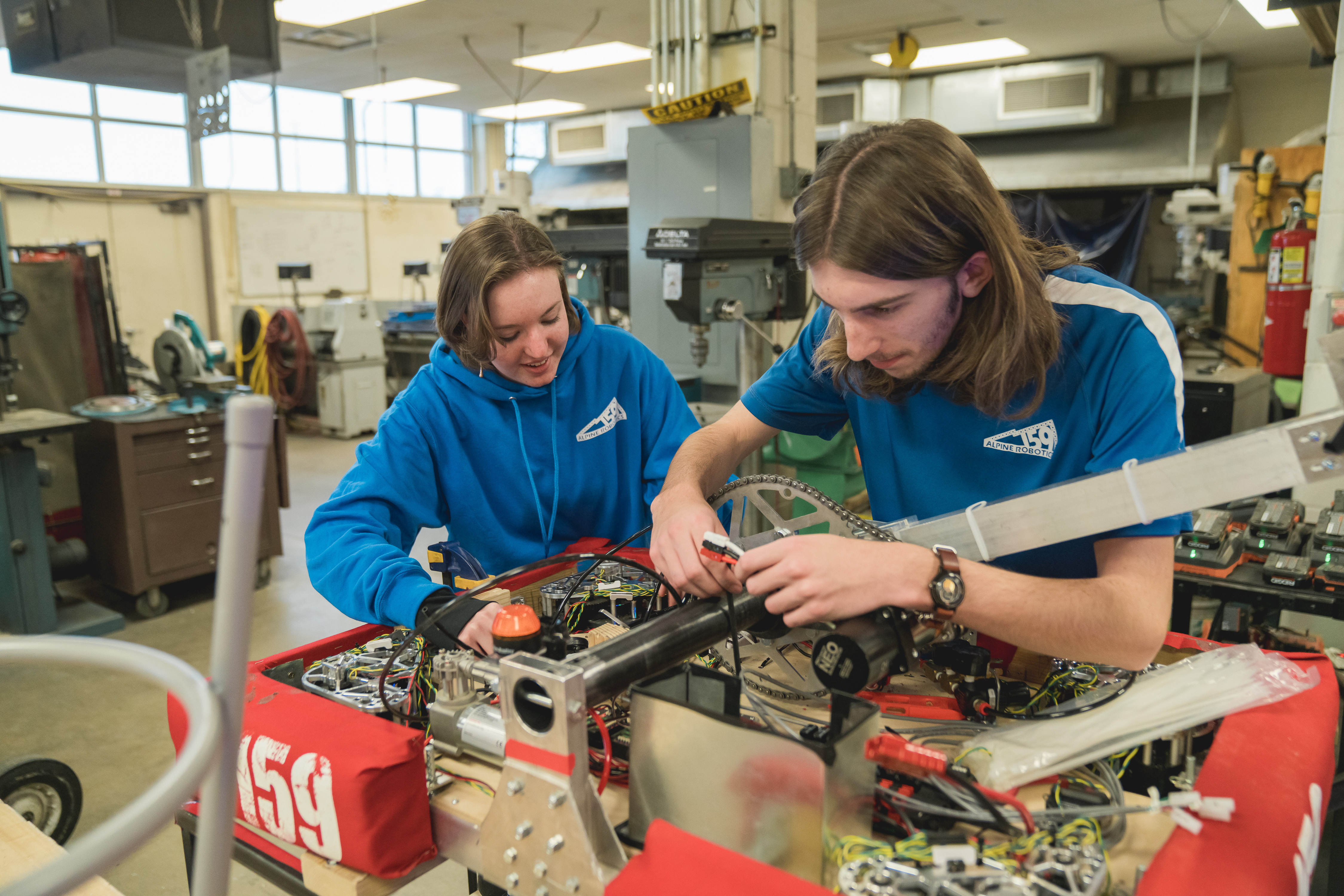 Students at work in a robotics club. 