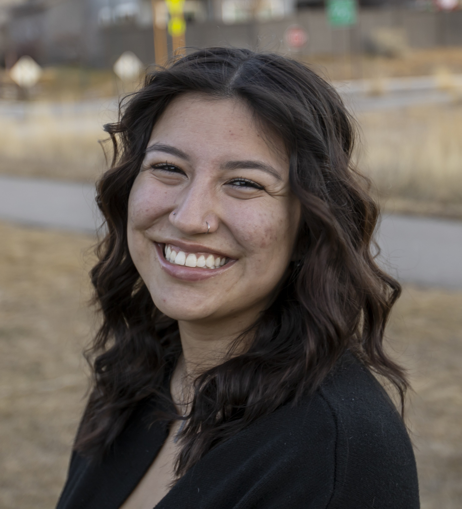 Gaby's headshot taken outdoors