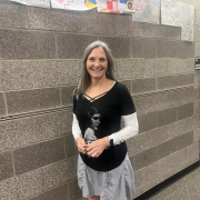 Mrs. Rutherford Posing in the hallway